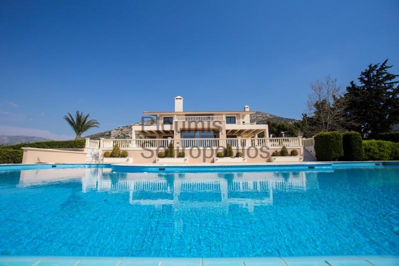 Seafront villa on the coast of Saronida Greece for Sale